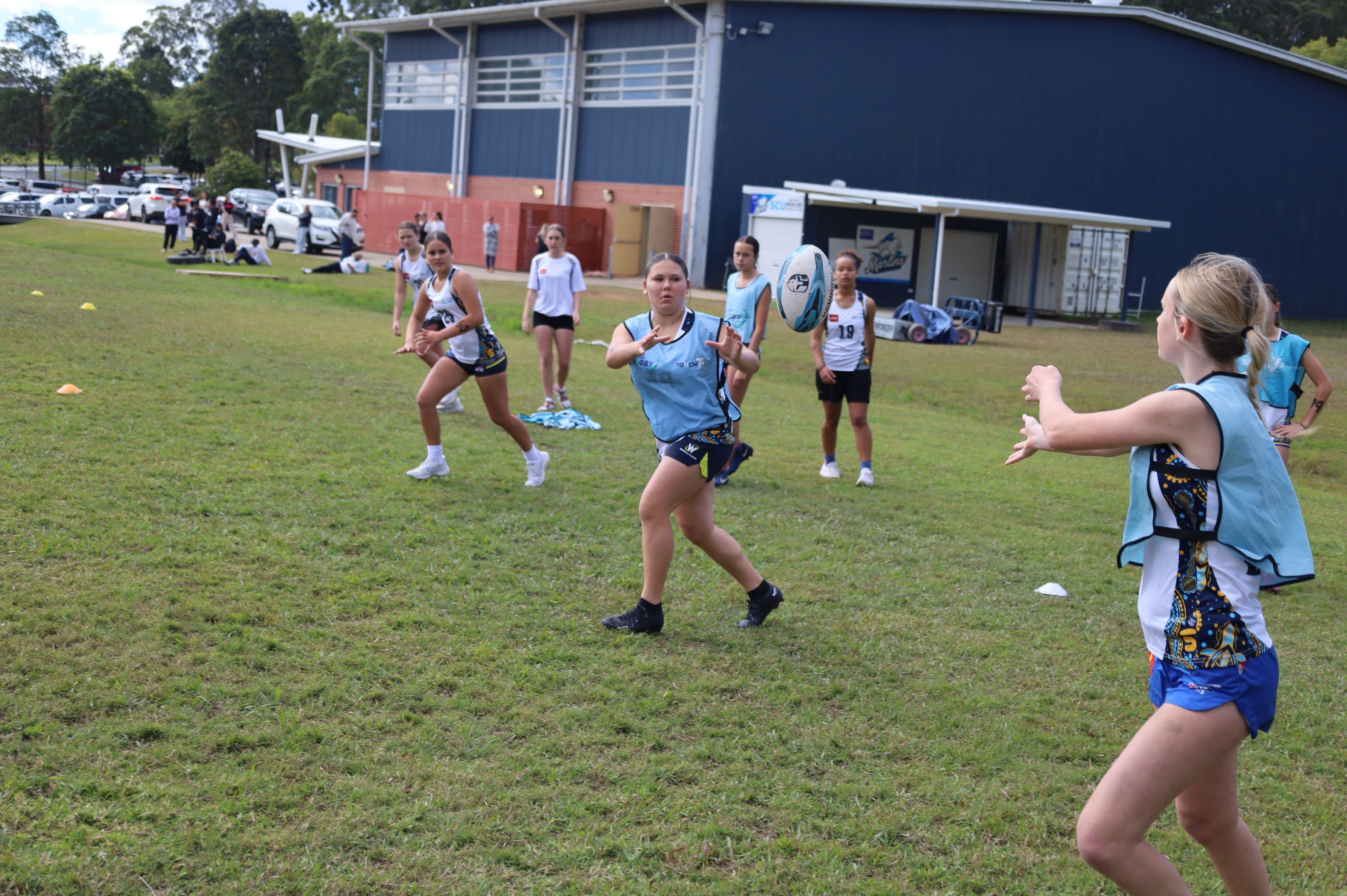Athletes taking part in a rugby skills session
